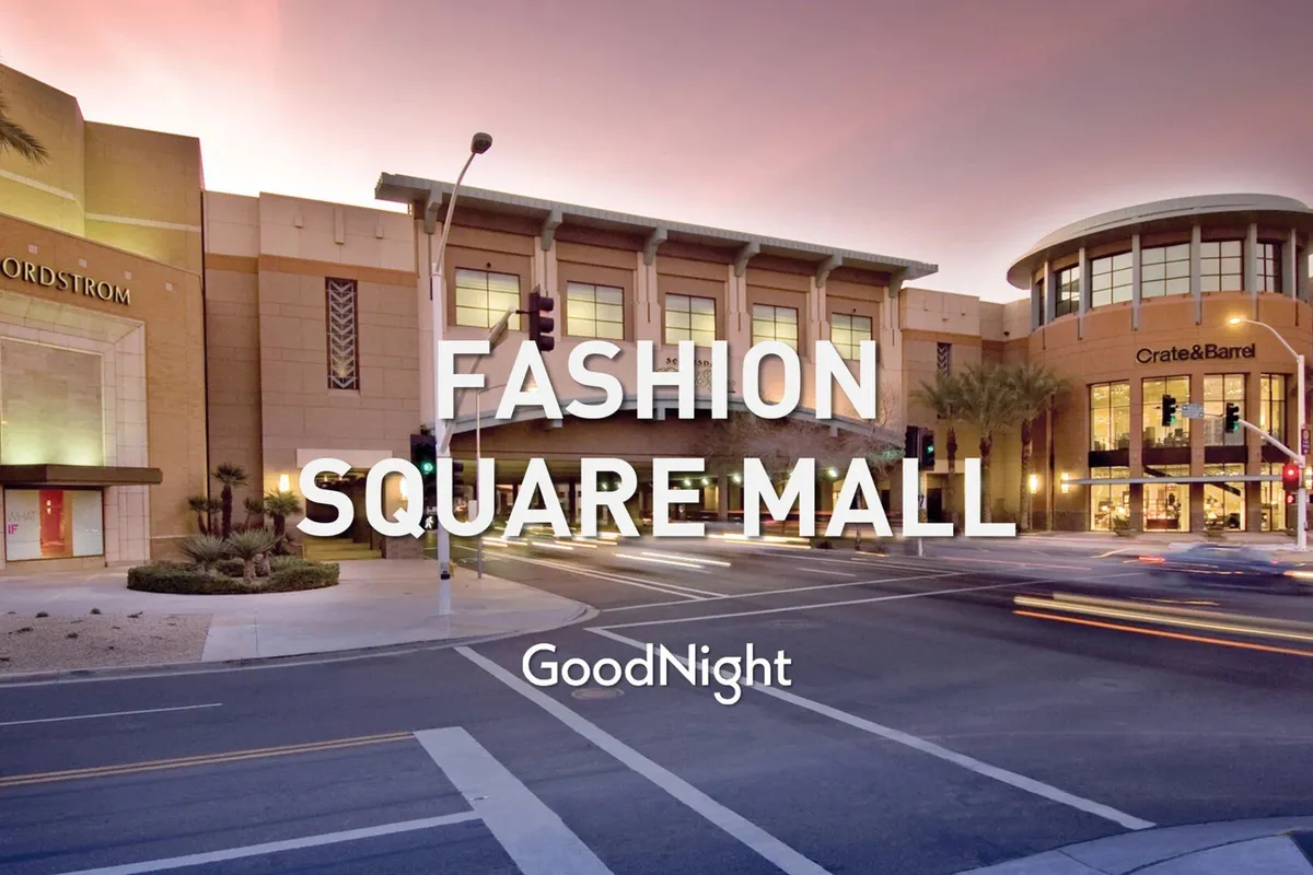 A bustling exterior scene capturing the entrances to Nordstrom and Crate & Barrel, with visible traffic signals and people engaging in shopping and dining. The mood is energetic and social, reflecting local attractions and dining options nearby.