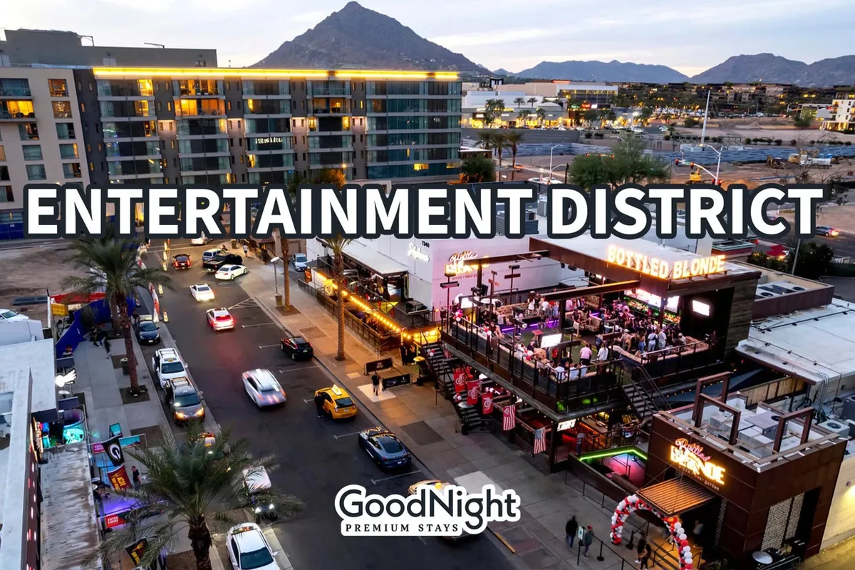 A colorful exterior snapshot of the entertainment district in Scottsdale, featuring the Bottled Blonde restaurant, entertainment signage, lively street activity, and a backdrop of mountains. The scene exudes excitement and the promise of vibrant nightlife and social opportunities.
